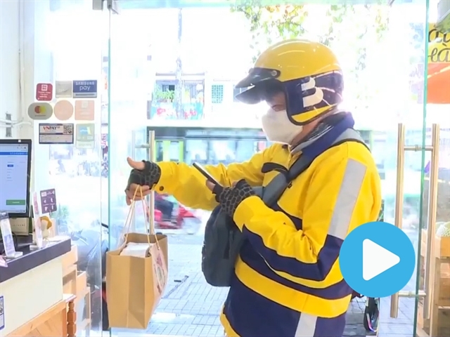 HCM City shops and eateries open for takeout
